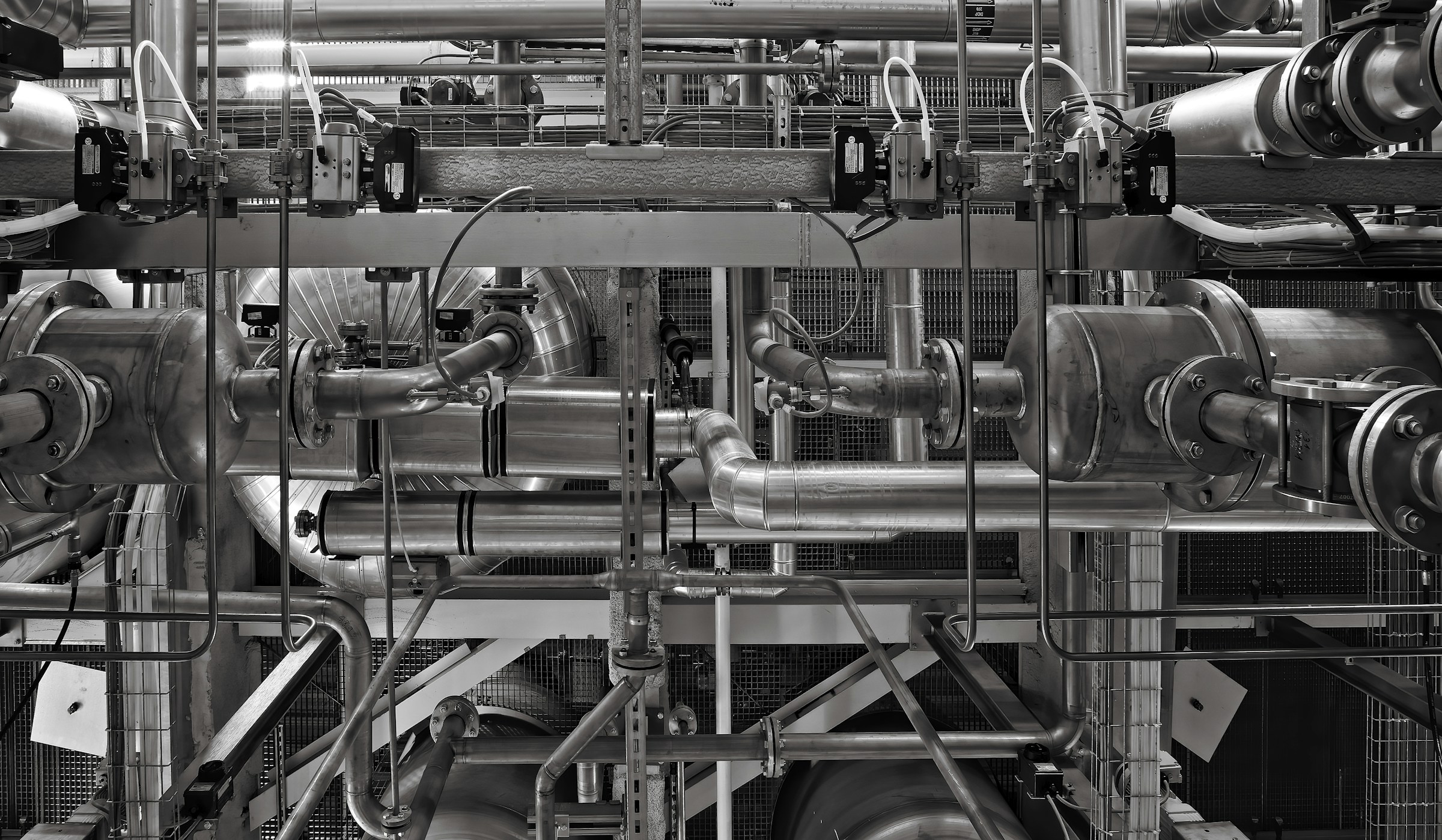 Industrial pipe network and valves in a facility
